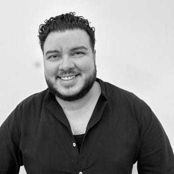 Portrait of Andre Ribera, a professional stylist at PR At Partners, showcasing their expertise and style.