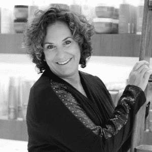 Portrait of Dede Castronovo, a professional stylist at PR at Partners, showcasing their expertise and style.