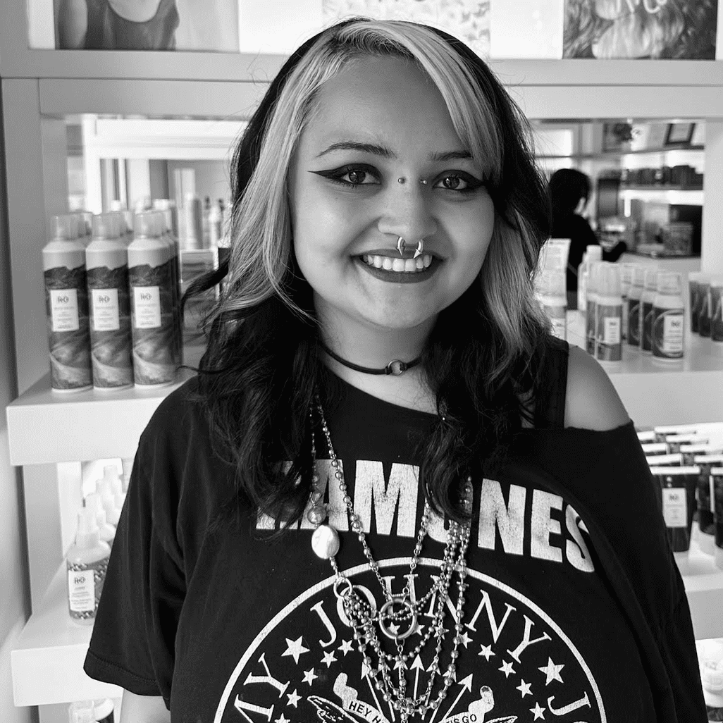 Portrait of Fi, a professional stylist at PR at Partners, showcasing their expertise and style.