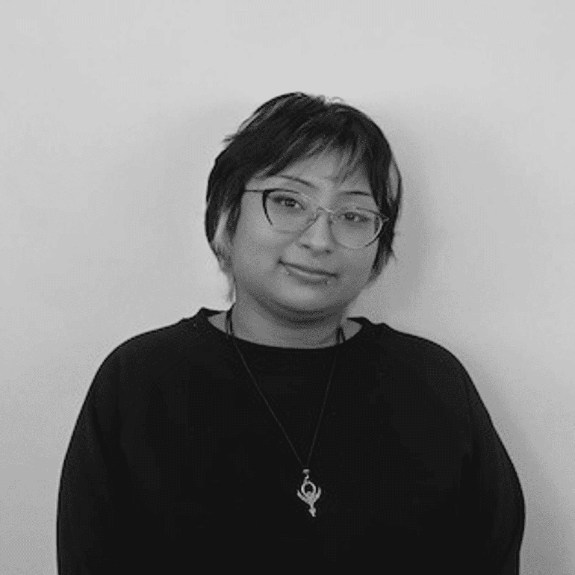 Portrait of Cat, a professional stylist at PR At Partners, showcasing their expertise and style.