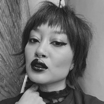 Portrait of Aja Hamilton, a professional stylist at PR At Partners, showcasing their expertise and style.