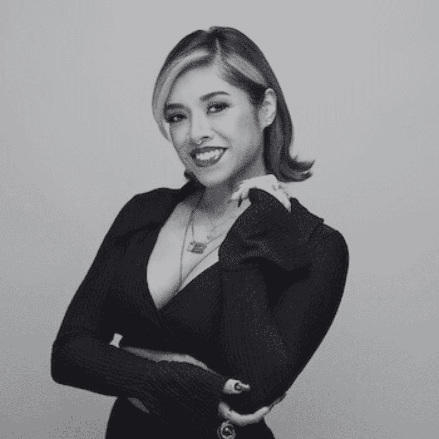 Portrait of Damari Canas, a professional stylist at PR At Partners, showcasing their expertise and style.