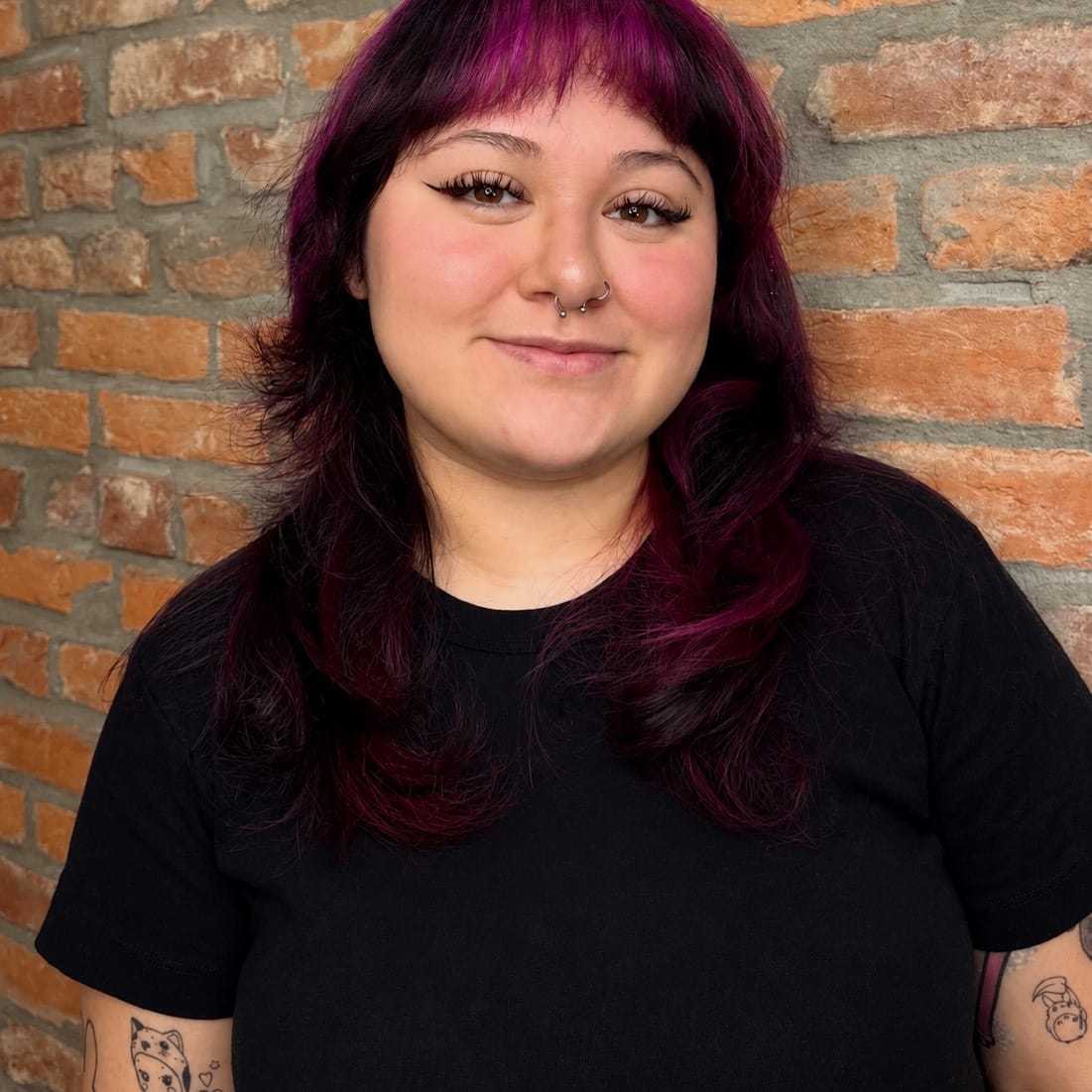 Portrait of Ariel, a professional stylist at PR at Partners, showcasing their expertise and style.