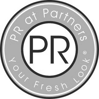 Portrait of Raquel Pedrazas, a professional stylist at PR at Partners, showcasing their expertise and style.