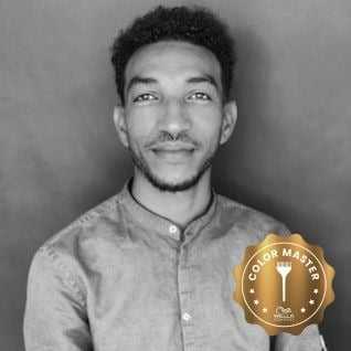 Portrait of Yonatan Habte, a professional stylist at PR at Partners, showcasing their expertise and style.