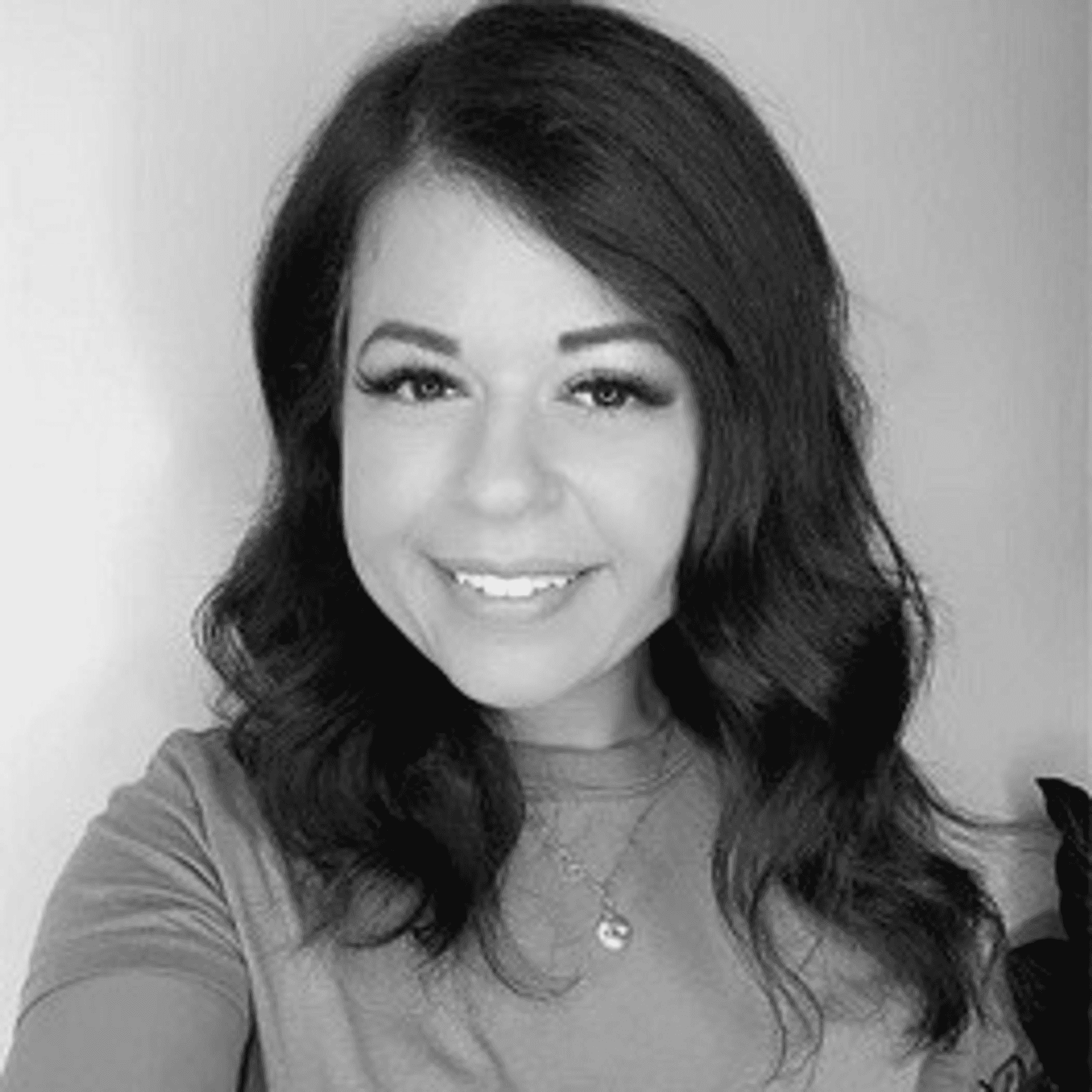 Portrait of Christina McAlpine, a professional stylist at PR At Partners, showcasing their expertise and style.