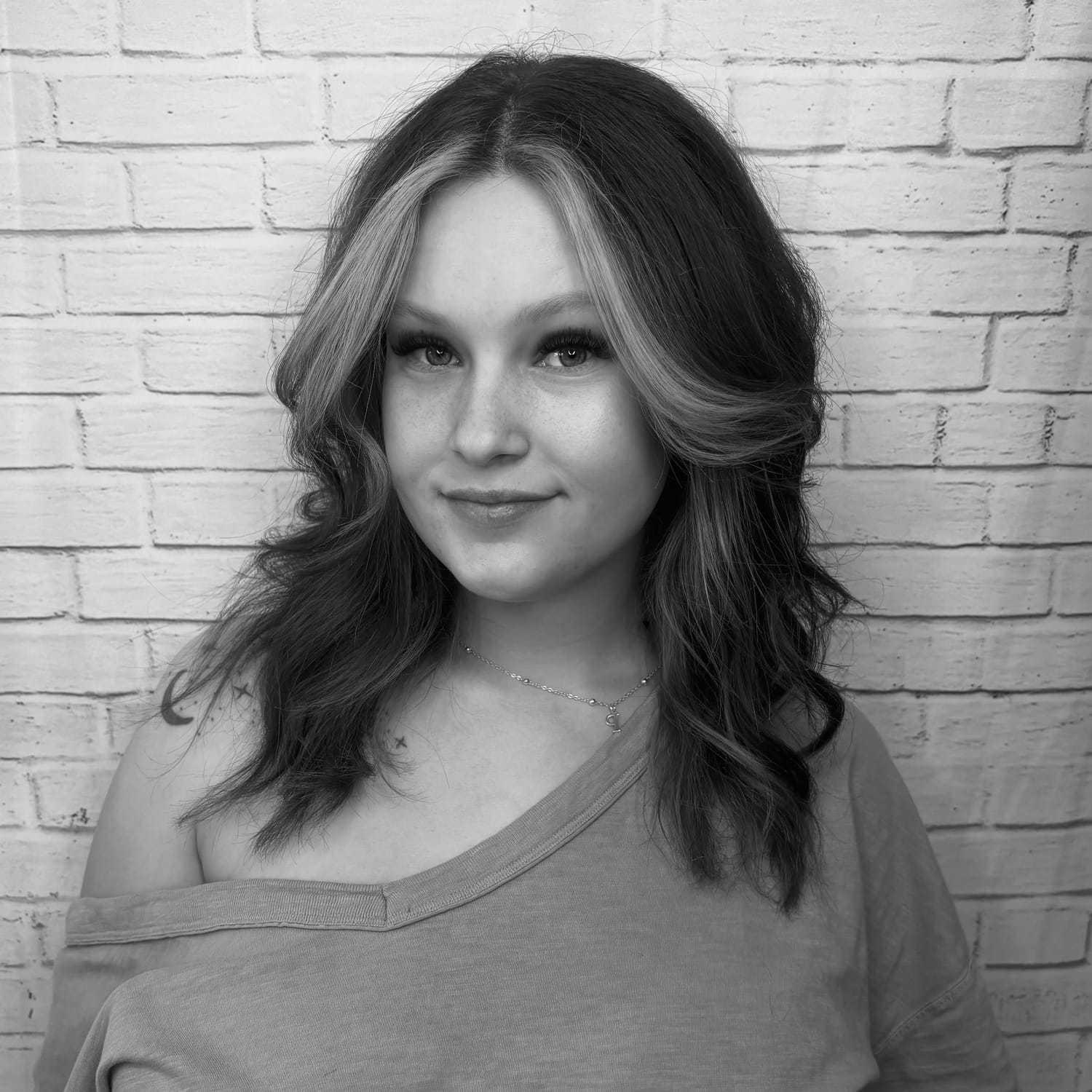 Portrait of Amie, a professional stylist at PR At Partners, showcasing their expertise and style.