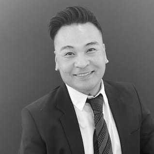 Portrait of Jon, a professional stylist at PR At Partners, showcasing their expertise and style.