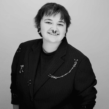 Portrait of Grayson, a professional stylist at PR At Partners, showcasing their expertise and style.