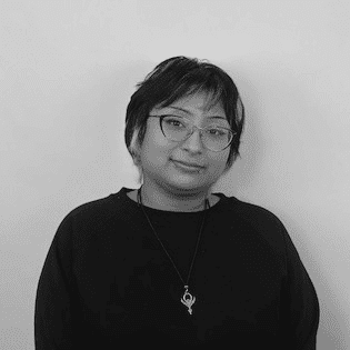 Portrait of Cat, a professional stylist at PR At Partners, showcasing their expertise and style.