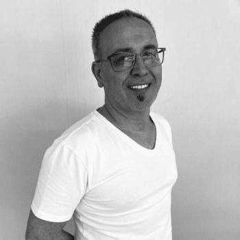 Portrait of Ishmail, a professional stylist at PR At Partners, showcasing their expertise and style.