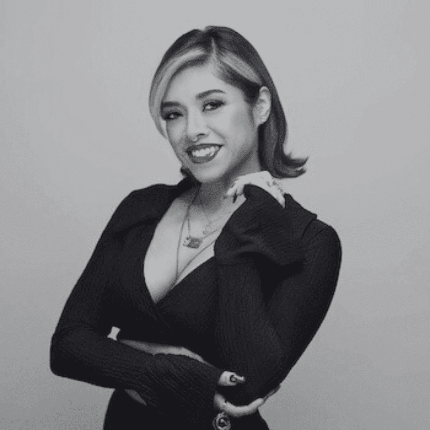 Portrait of Damari Canas, a professional stylist at PR At Partners, showcasing their expertise and style.